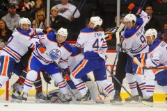 30 SEP 2011: All five skates of the Edmonton Oilers collapse around the goalie, Devan Dubnyk, against the Minnesota Wild  in the first period in a preseason game at the Xcel Energy Center in St. Paul, Minn. The Oilers beat the Wild in an overtime shoot out, 4-3.