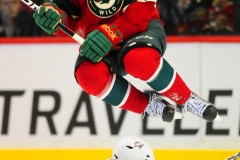 19 MAR 2011:  Minnesota Wild winger Cal Clutterbuck jumps out of the way of a slap shot from the point in the third period against the Columbus Blue Jackets at the Xcel Energy Center in St. Paul, Minn. The Blue Jackets beat the Wild in overtime, 5-4.