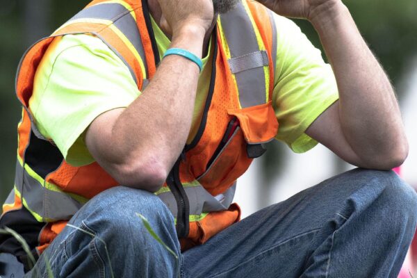 Construction worker on his cell phone